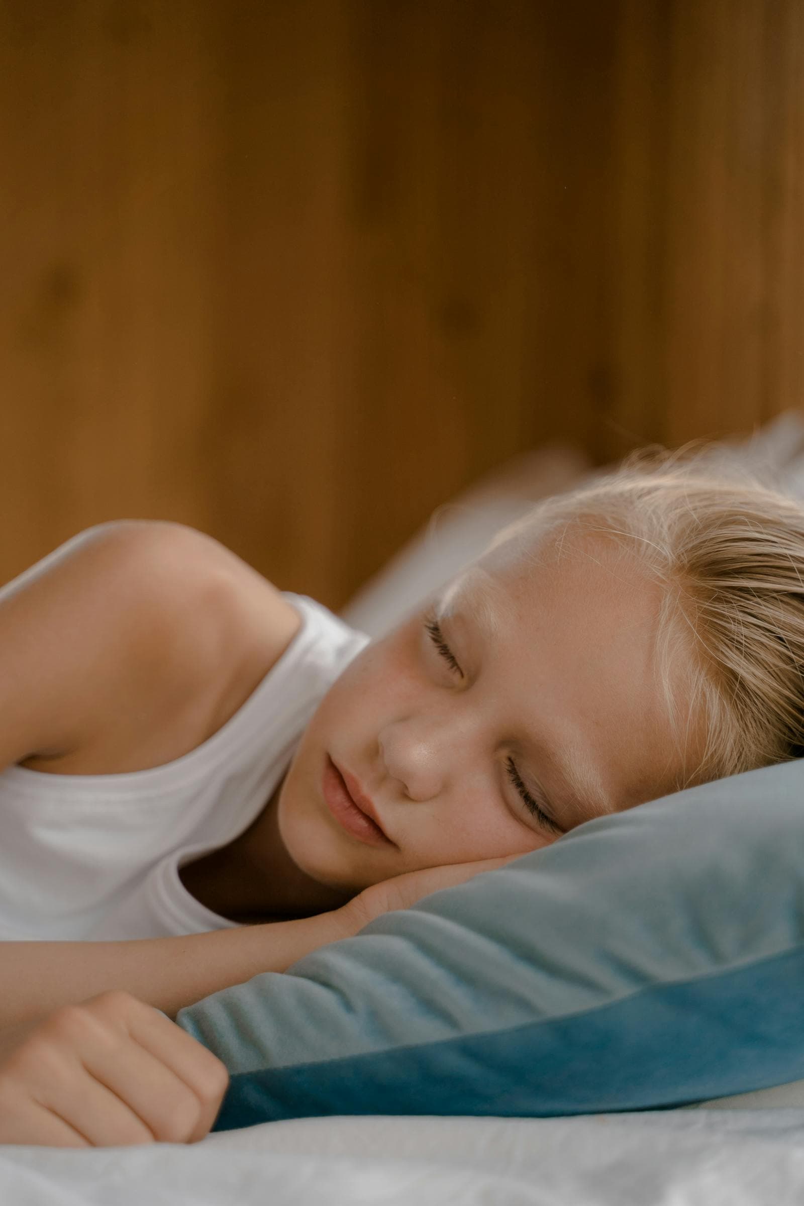Child sleeping softly with warm night light